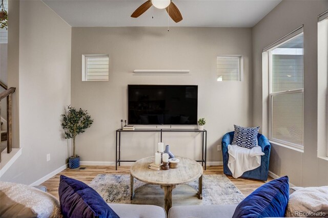 1341 Solitaire St, Colorado Springs, CO 80905 - living area with wood finished floors, baseboards, and ceiling fan