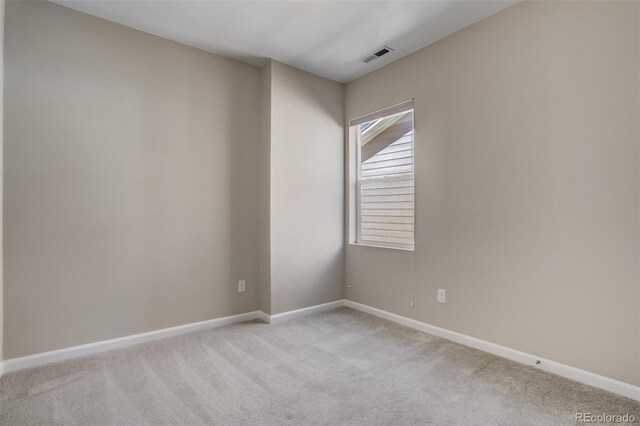 1341 Solitaire St, Colorado Springs, CO 80905 - empty room with baseboards, visible vents, and carpet flooring