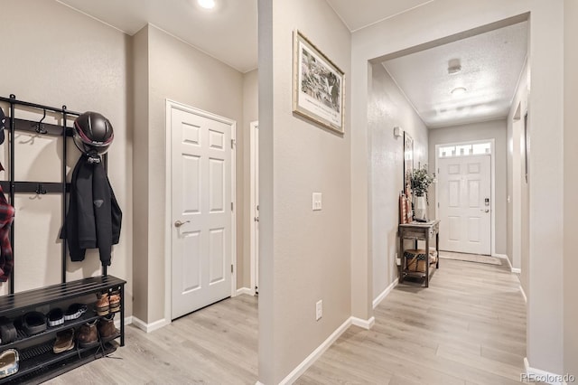 mudroom featuring light wood-type flooring