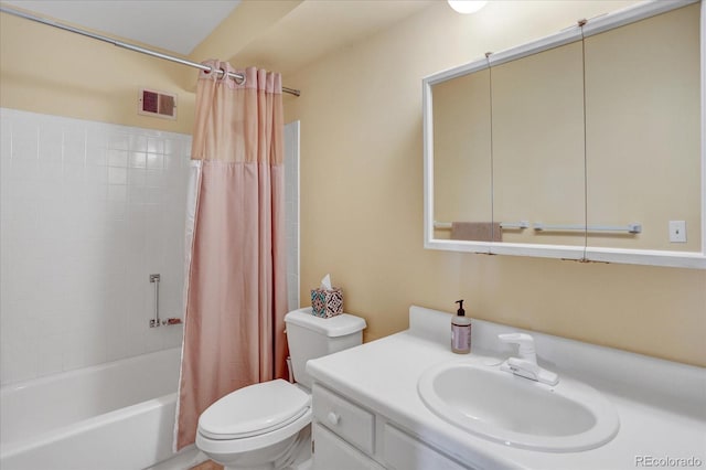 full bathroom featuring shower / bath combo, visible vents, vanity, and toilet