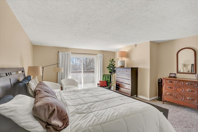 bedroom featuring carpet, a textured ceiling, baseboards, and access to outside