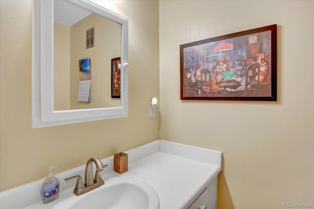 bathroom featuring visible vents and vanity