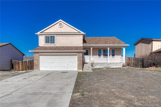 view of front of home with concrete driveway, an attached garage, covered porch, fence, and stucco siding