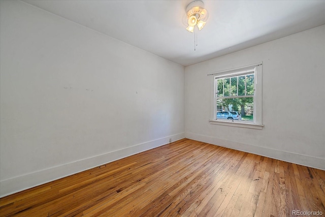 empty room featuring wood-type flooring