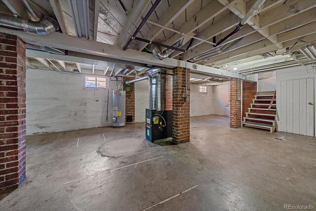 basement with heating unit and water heater