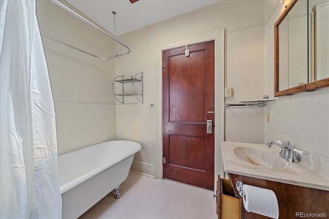 bathroom featuring a bathing tub and vanity