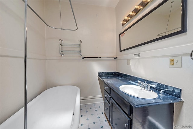 bathroom featuring vanity and a bathtub