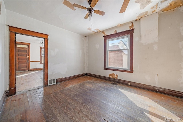 empty room featuring ceiling fan and wood-type flooring