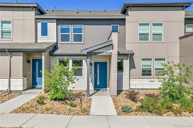 6459 N Dunkirk St, Denver, CO 80249 - multi unit property featuring roof with shingles