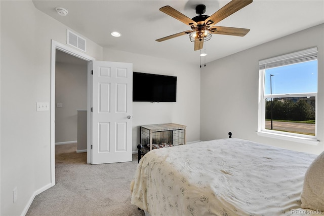 6459 N Dunkirk St, Denver, CO 80249 - bedroom with light carpet, baseboards, a ceiling fan, and recessed lighting