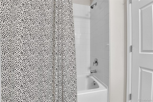 6459 N Dunkirk St, Denver, CO 80249 - bathroom featuring shower / bath combination