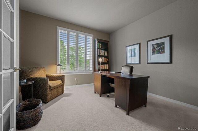 10524 Serengeti Dr, Lone Tree, CO 80124 - office area featuring light colored carpet and baseboards