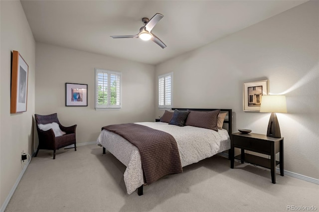 10524 Serengeti Dr, Lone Tree, CO 80124 - bedroom with baseboards, light colored carpet, and ceiling fan