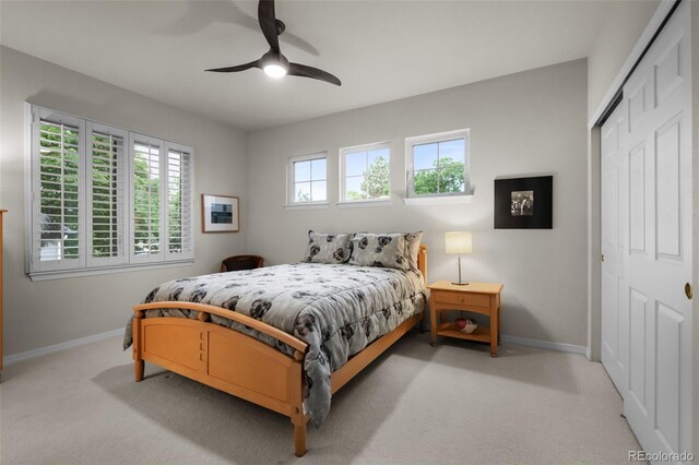 10524 Serengeti Dr, Lone Tree, CO 80124 - bedroom with baseboards, a closet, and carpet