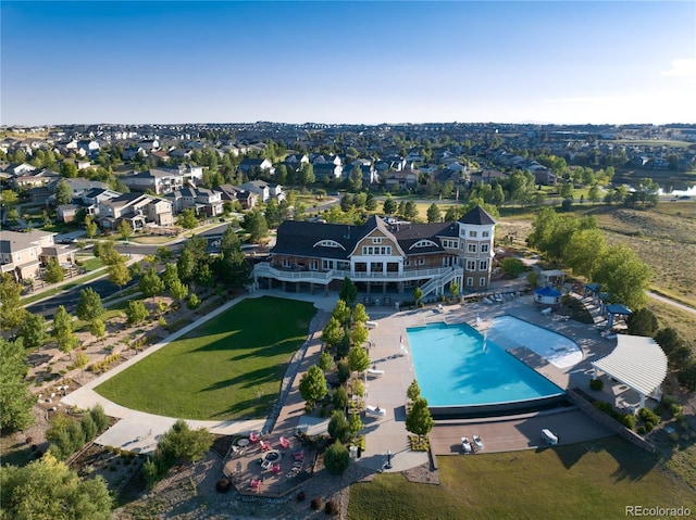 birds eye view of property with a residential view