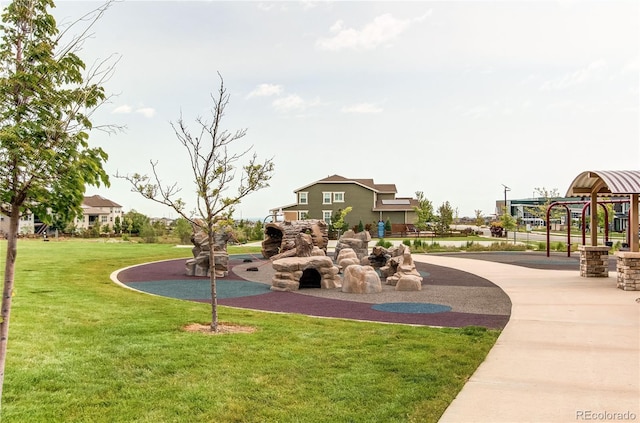 9571 Yucca Ct, Arvada, CO 80007 - view of play area featuring a lawn