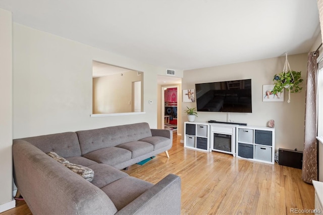 1817 S Perry Way, Denver, CO 80219 - living area featuring wood finished floors