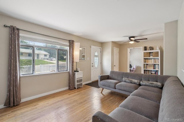 1817 S Perry Way, Denver, CO 80219 - living area featuring ceiling fan and wood finished floors