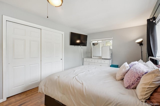 1817 S Perry Way, Denver, CO 80219 - bedroom with wood finished floors and a closet