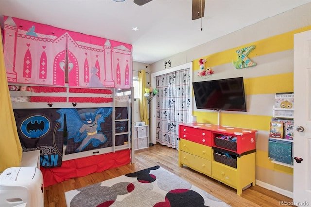 1817 S Perry Way, Denver, CO 80219 - recreation room featuring wood finished floors and a ceiling fan