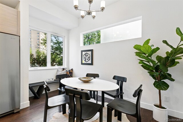 2830 W 32nd Ave, Denver, CO 80211 - dining space with dark wood-type flooring and a chandelier