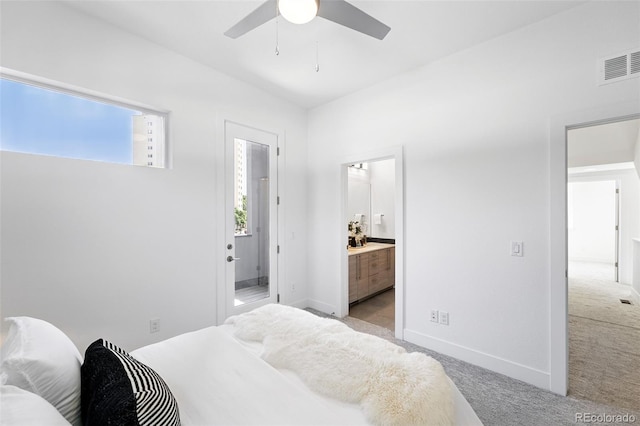 2830 W 32nd Ave, Denver, CO 80211 - bedroom with light carpet, ensuite bath, and ceiling fan