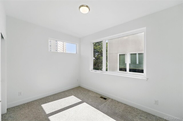 2830 W 32nd Ave, Denver, CO 80211 - carpeted spare room with baseboards