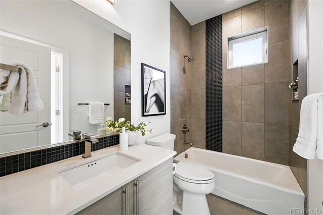2830 W 32nd Ave, Denver, CO 80211 - bathroom featuring vanity, washtub / shower combination, and tile patterned floors