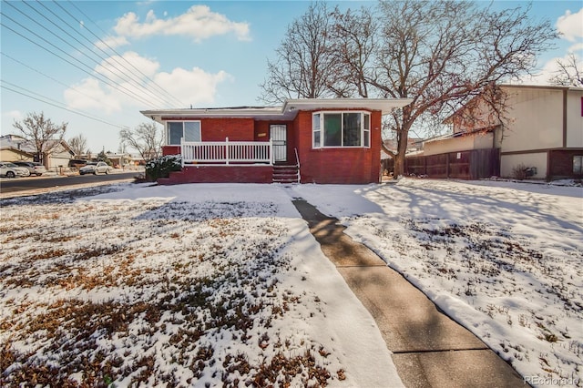 2200 W Moffat Pl, Denver, CO 80221 - view of front of property with brick siding and covered porch