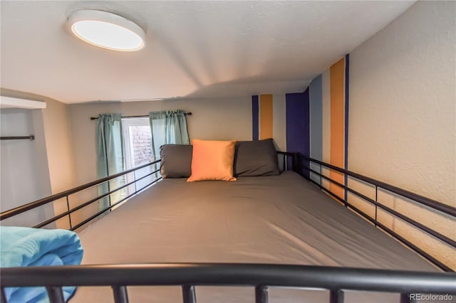 unfurnished bedroom with carpet floors