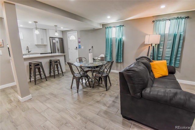 dining area featuring sink