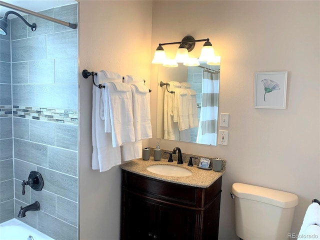 full bathroom featuring shower / tub combo with curtain, vanity, and toilet