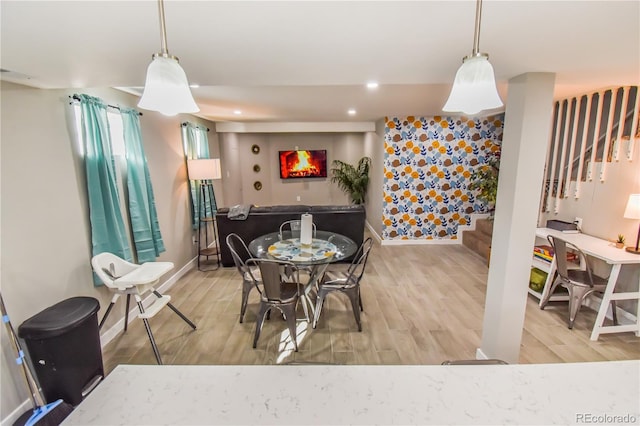 dining room featuring light hardwood / wood-style floors