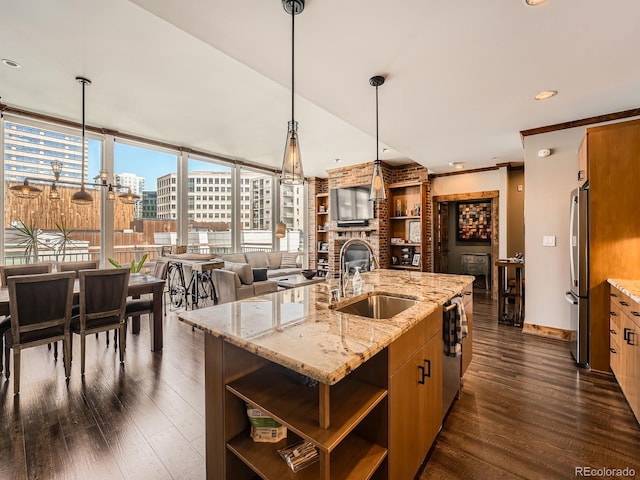 1401 Delgany St Unit 409, Denver, CO 80202 - kitchen featuring appliances with stainless steel finishes, open shelves, a sink, dark wood-style floors, and decorative light fixtures