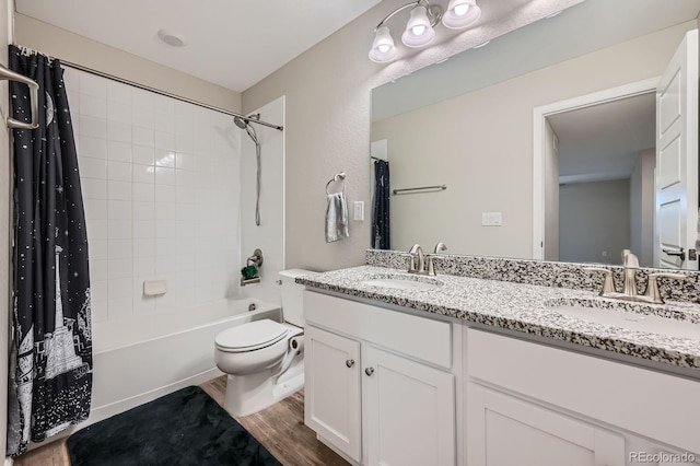 5256 Trails Edge Ln, Castle Rock, CO 80104 - full bathroom with a sink, double vanity, toilet, and wood finished floors