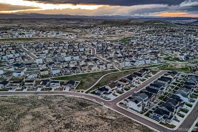 5256 Trails Edge Ln, Castle Rock, CO 80104 - aerial view at dusk featuring a residential view and a mountain view