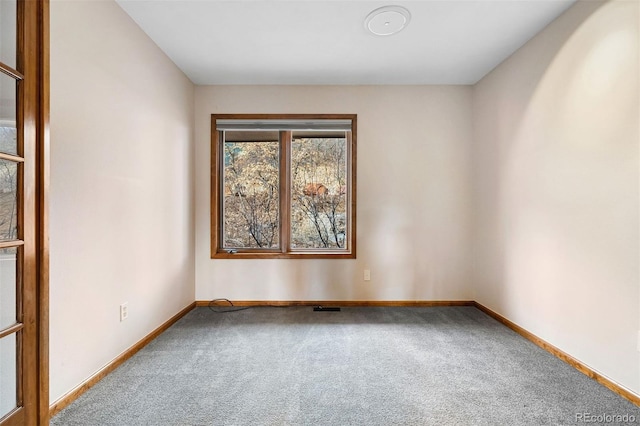 view of carpeted spare room