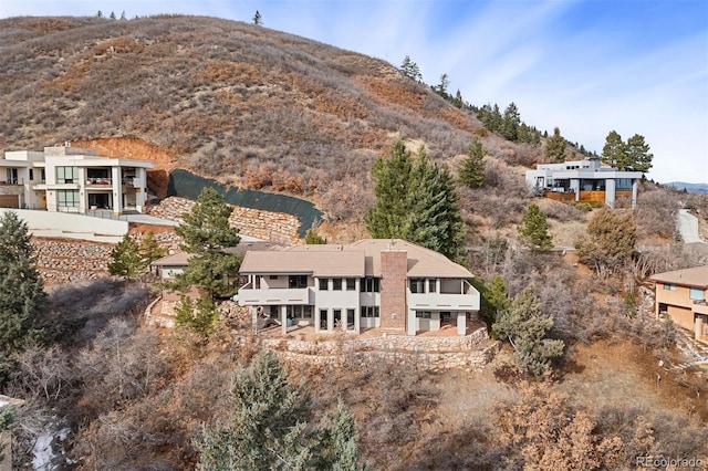 drone / aerial view featuring a mountain view