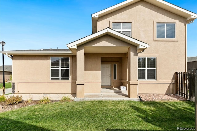 exterior space featuring a front lawn