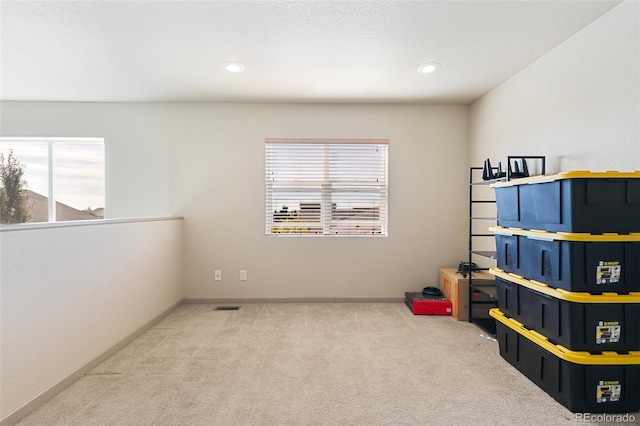 recreation room featuring carpet flooring