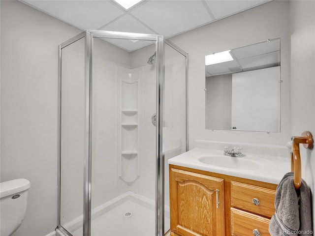 655 Gooseberry Ct, Lafayette, CO 80026 - bathroom featuring a shower stall, vanity, and a drop ceiling