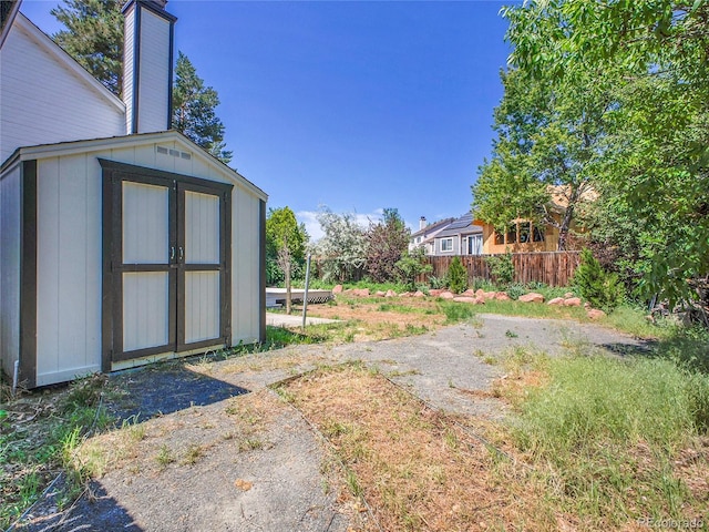 655 Gooseberry Ct, Lafayette, CO 80026 - view of yard featuring a storage shed