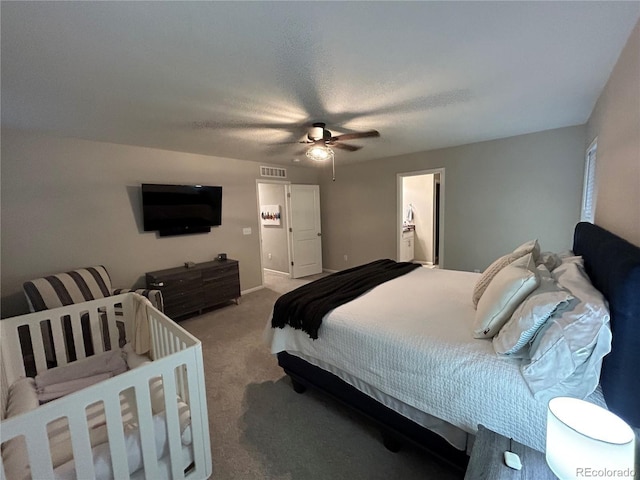 12901 Crane River Dr, Longmont, CO 80504 - bedroom with ceiling fan, visible vents, and carpet floors