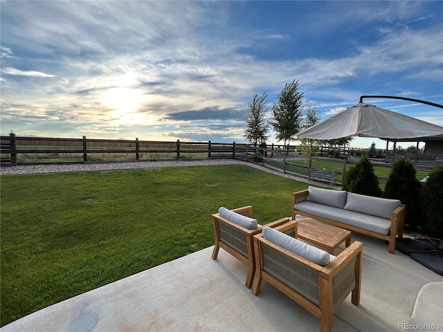12901 Crane River Dr, Longmont, CO 80504 - view of yard with a fenced backyard, a patio, and an outdoor hangout area