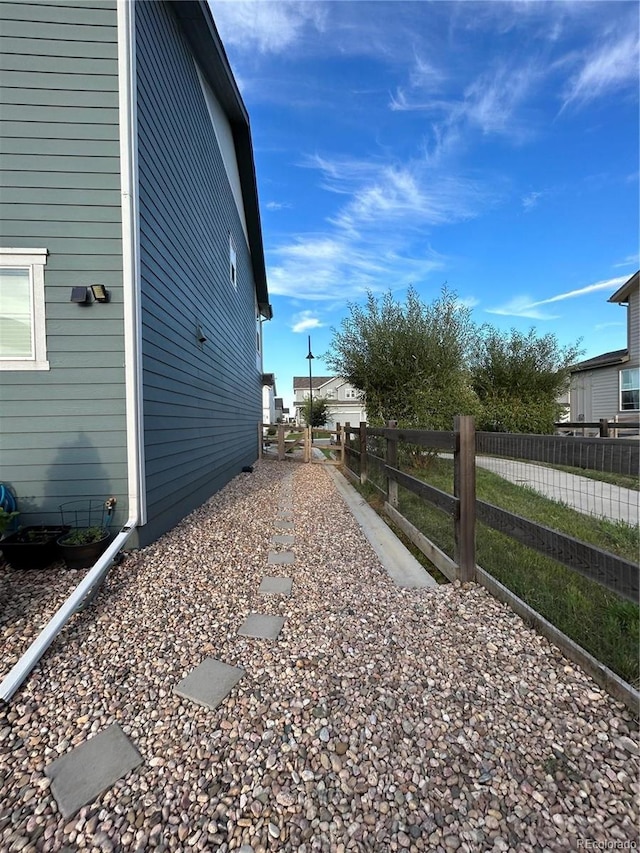 12901 Crane River Dr, Longmont, CO 80504 - view of side of property with fence