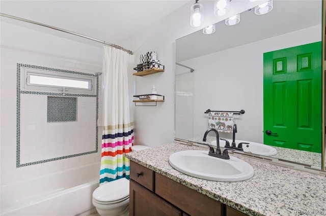 full bathroom featuring shower / tub combo with curtain, vanity, and toilet