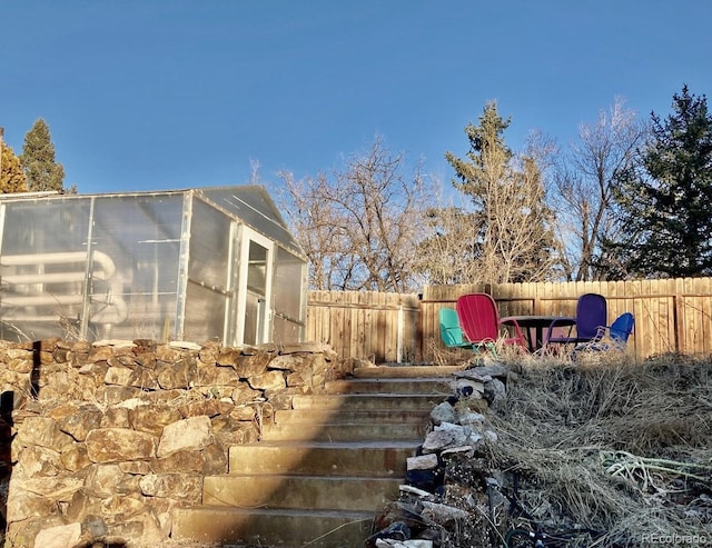 exterior space featuring an outbuilding