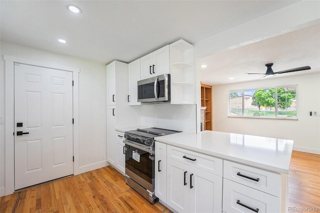 2280 Sherrelwood Dr, Denver, CO 80221 - kitchen with appliances with stainless steel finishes, open shelves, a peninsula, recessed lighting, and decorative backsplash