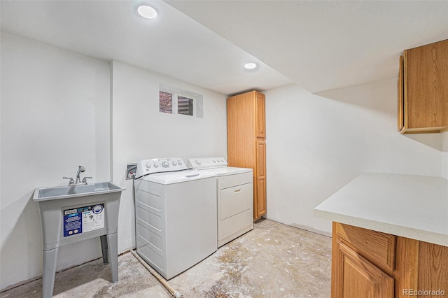 2280 Sherrelwood Dr, Denver, CO 80221 - laundry area with cabinet space, recessed lighting, and washer and dryer