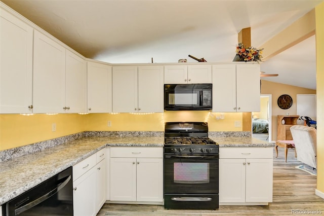 15980 County Road 306, Buena Vista, CO 81211 - kitchen with white cabinetry, black appliances, and light wood-style floors
